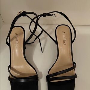 Elegant Black Heels with Strappy Design